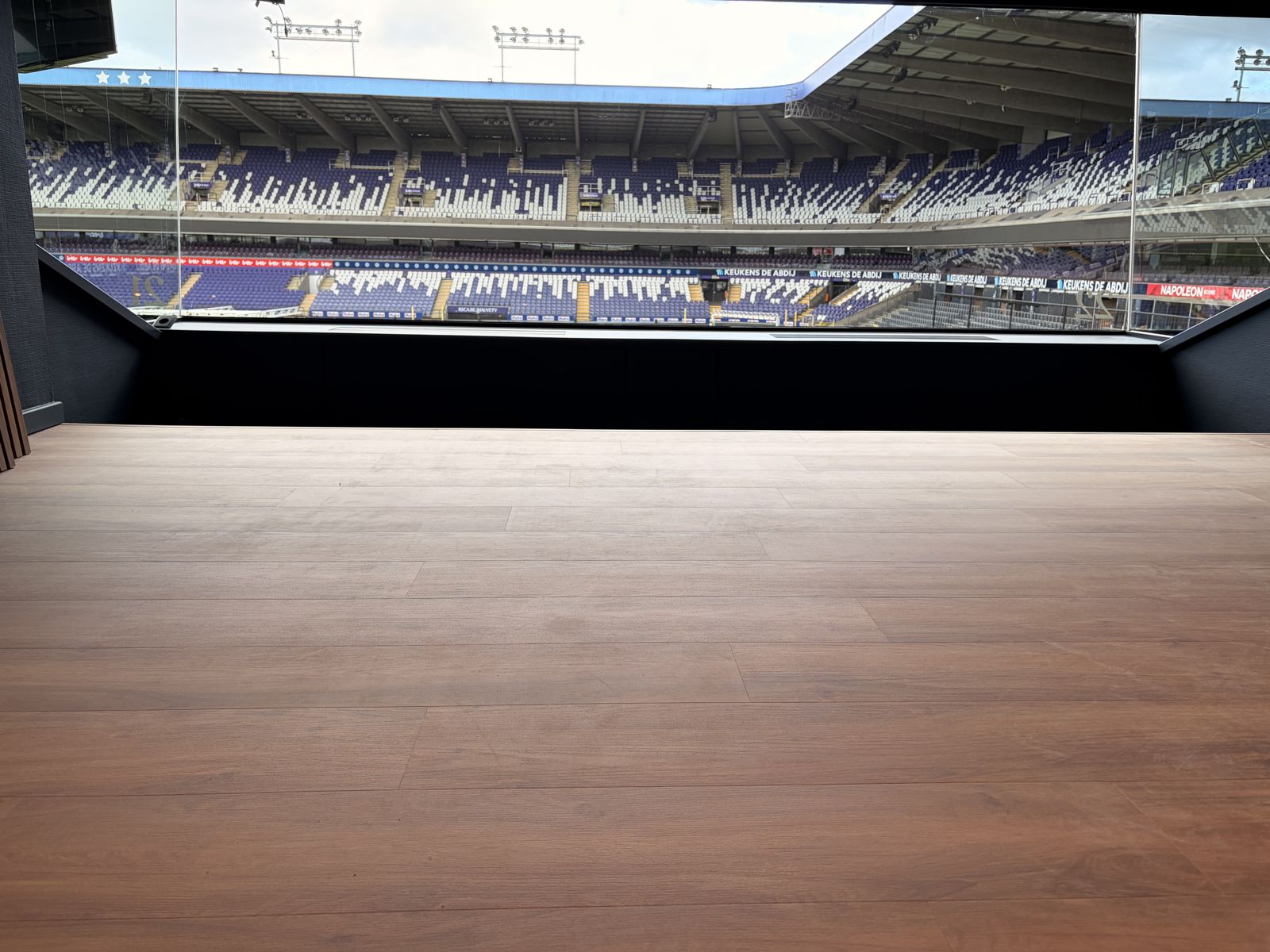 New wood-effect floor facing the pitch