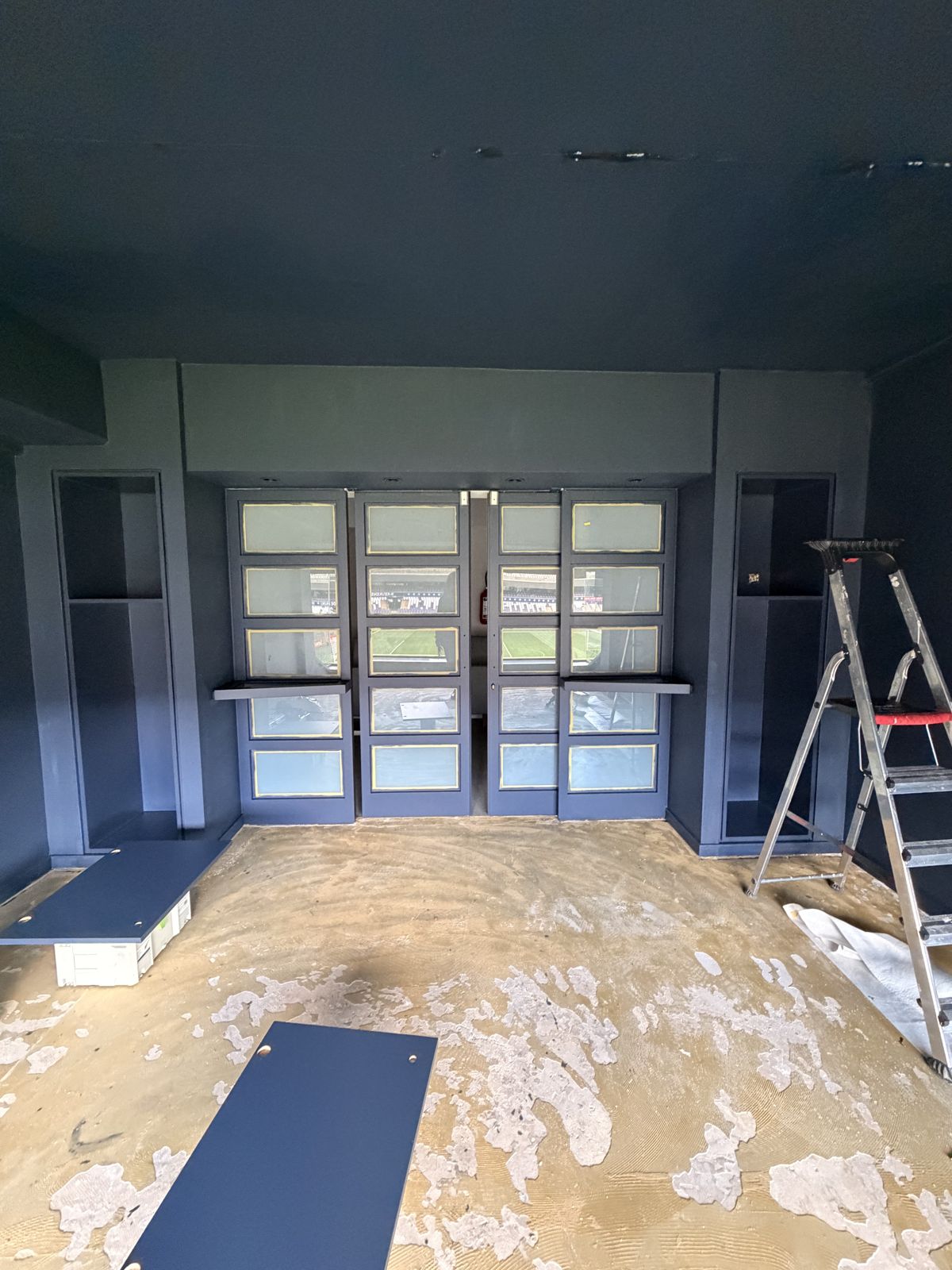 Works in progress – walls painted midnight blue