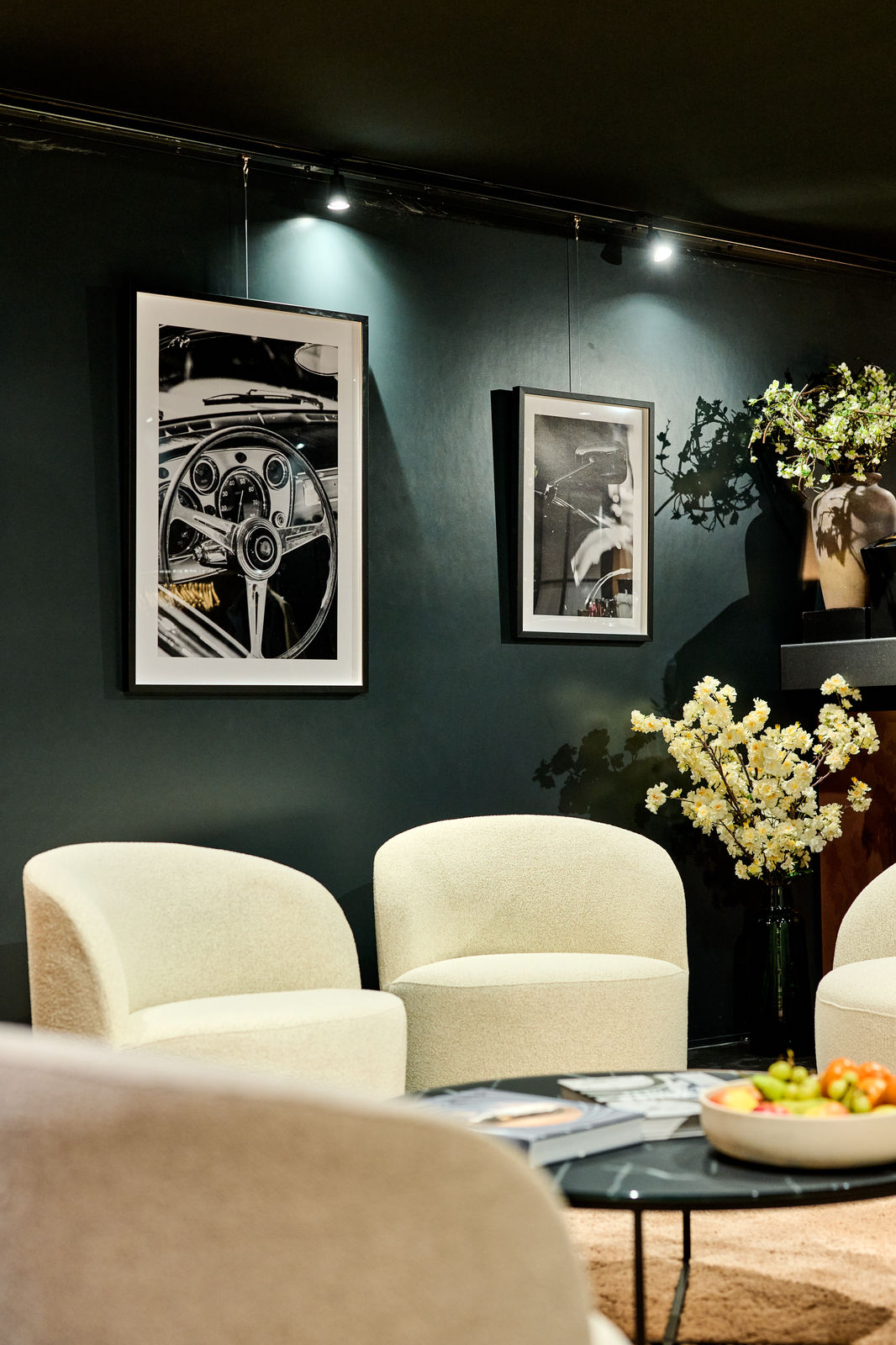 Wall detail with framed automotive photography